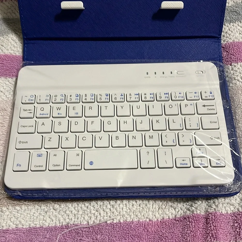 Blue tablet case with keyboard with locking mechanism for tablet